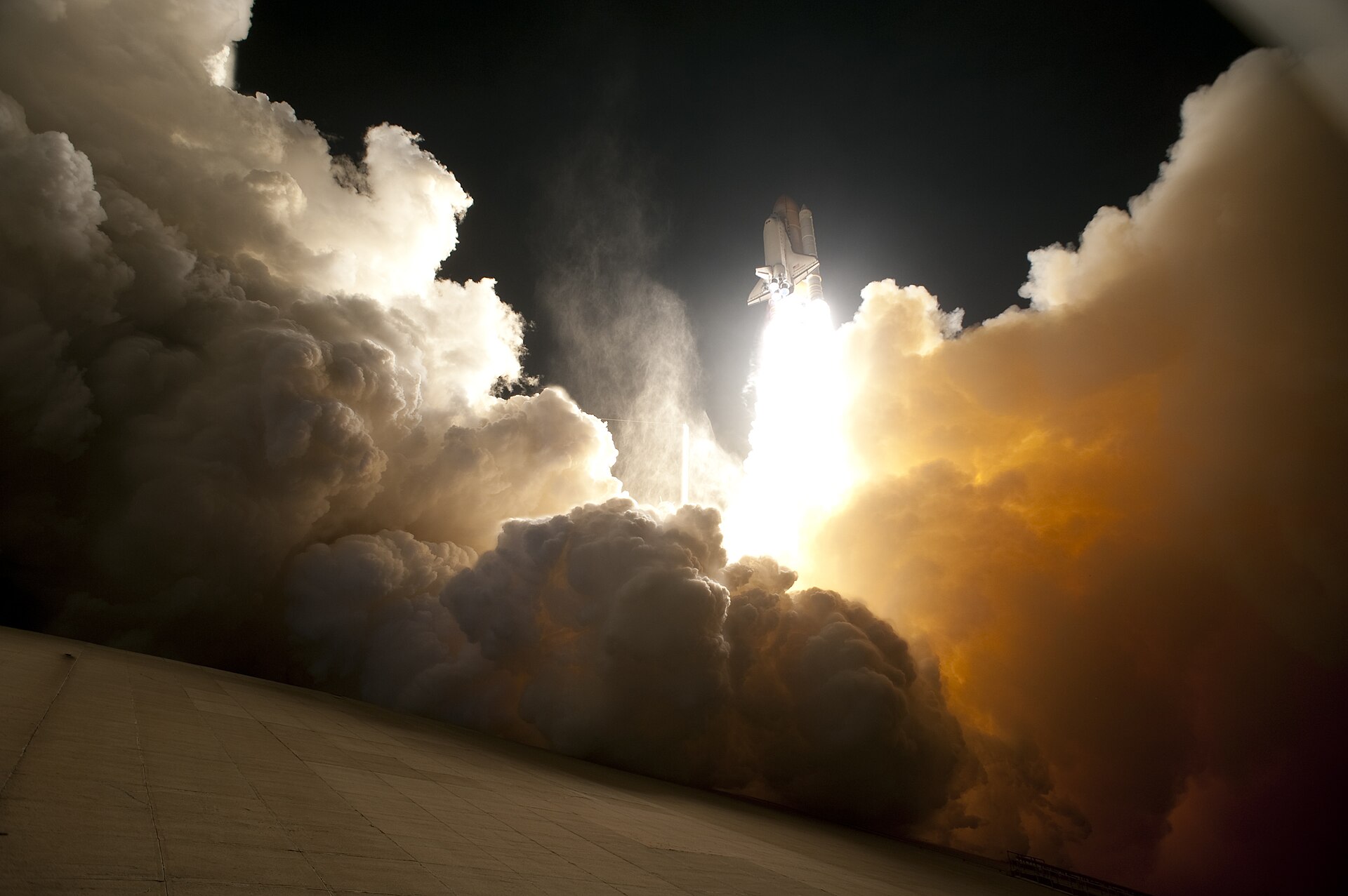 STS-130 exhaust cloud engulfs Launch Pad 39A.jpg