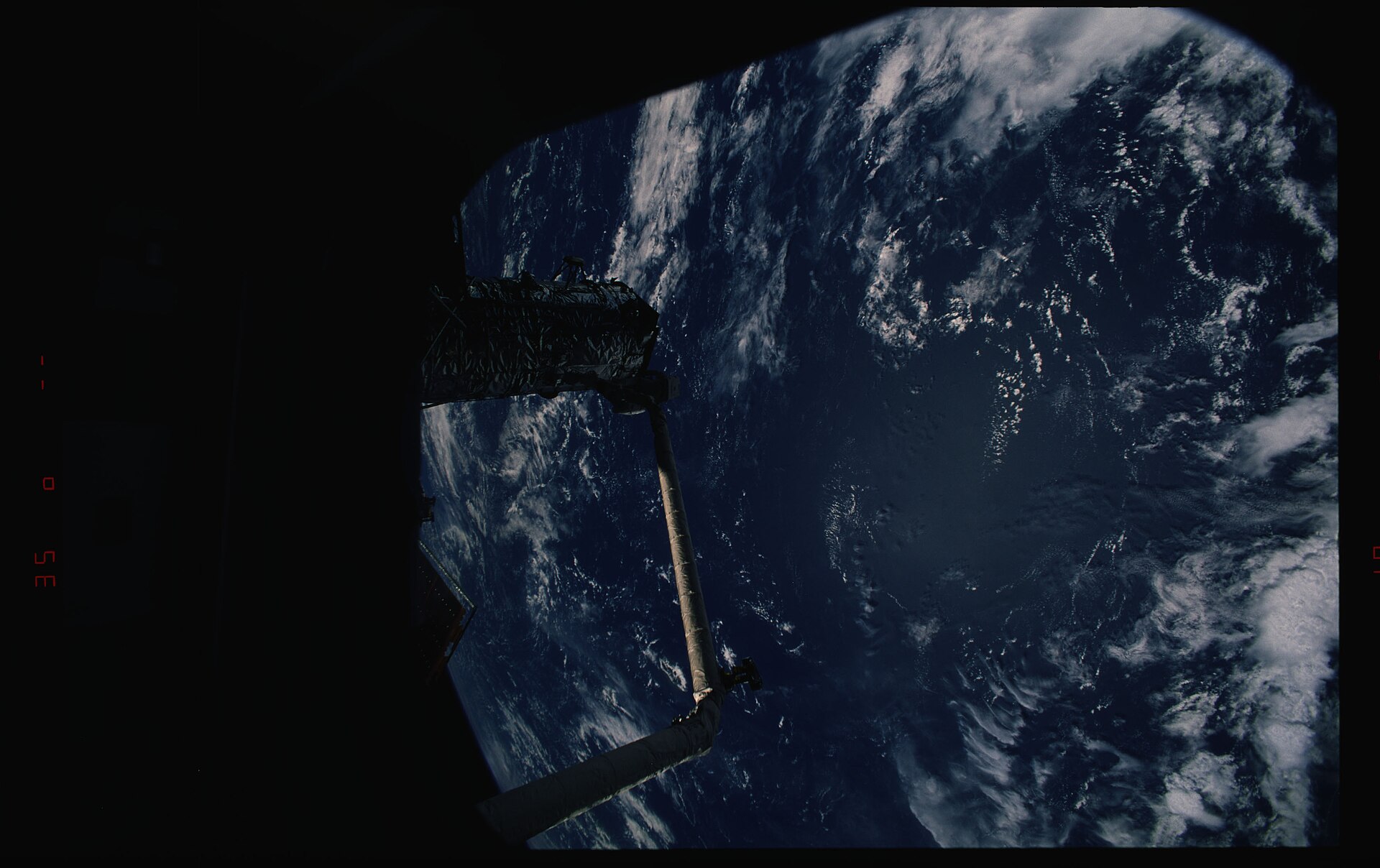 STS082-309-002 - STS-082 - EVA 4 activity on Flight Day 7 to service the Hubble 
